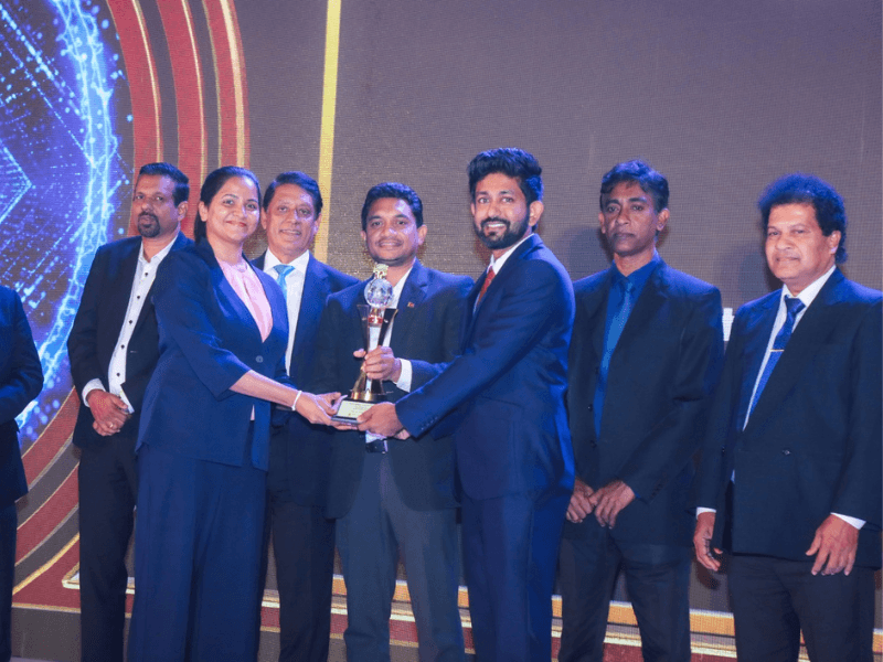 Hotzy Foods receiving recognition on an awards stage