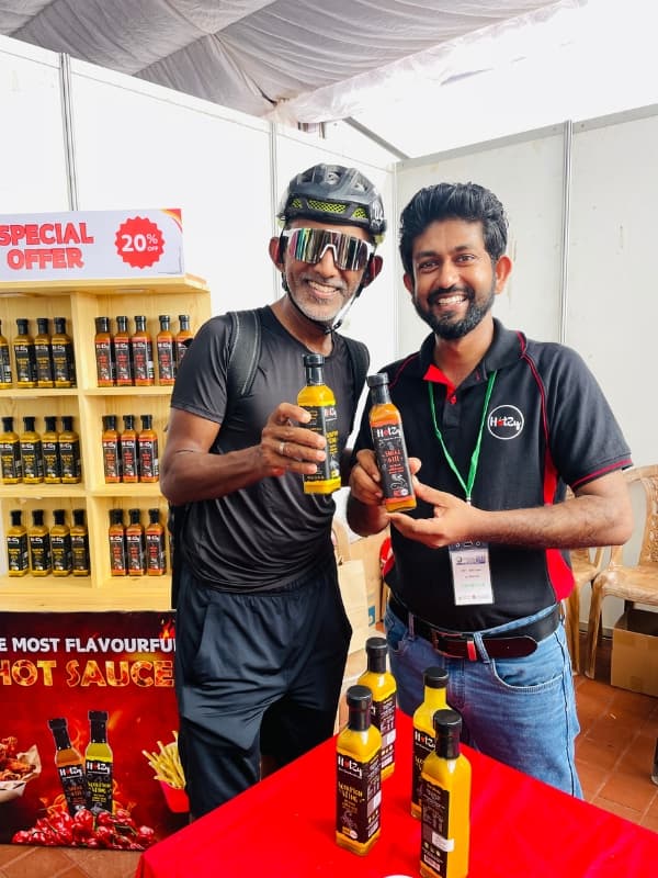 Hotzy Foods product display at a local event